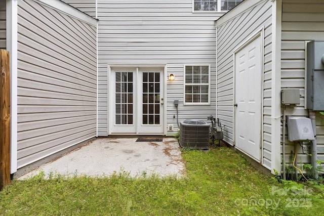 13660 Meade Glen Ct, Charlotte, NC 28273 - doorway to property with central air condition unit and a patio area