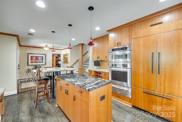16317 Terry Ln, Huntersville, NC 28078 - kitchen with visible vents, baseboards, a center island, stainless steel double oven, and a warming drawer