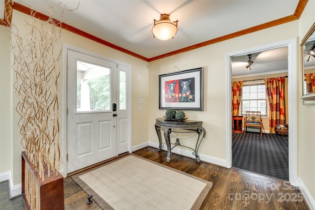 16317 Terry Ln, Huntersville, NC 28078 - entryway featuring crown molding, baseboards, and dark wood-type flooring