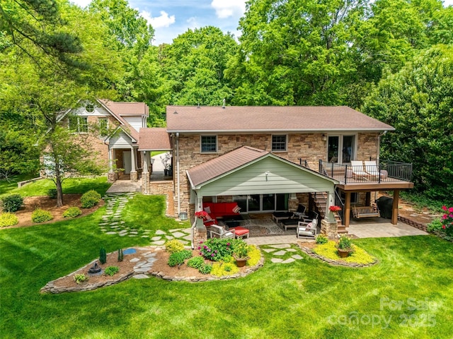 16317 Terry Ln, Huntersville, NC 28078 - back of house featuring roof with shingles, stone siding, a patio area, a balcony, and a yard