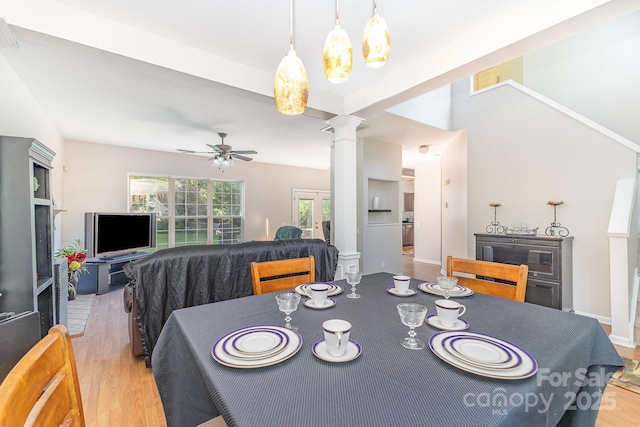 815 Clearbrook Rd, Matthews, NC 28105 - dining room featuring light wood-style floors, a ceiling fan, and ornate columns