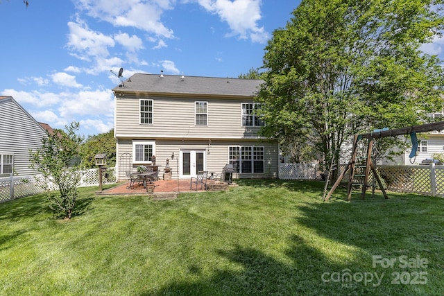 815 Clearbrook Rd, Matthews, NC 28105 - back of house featuring a patio, a fenced backyard, a yard, and french doors