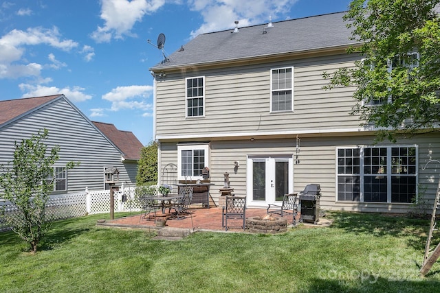 815 Clearbrook Rd, Matthews, NC 28105 - back of property with a lawn, fence, and a patio area