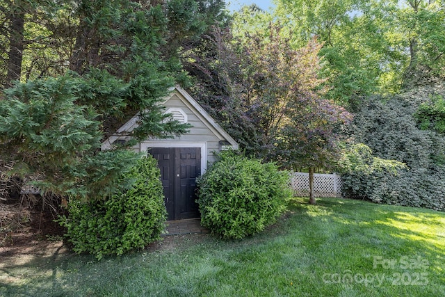 815 Clearbrook Rd, Matthews, NC 28105 - view of shed featuring fence