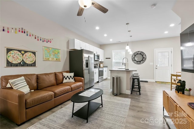 106 Dalton St, Black Mountain, NC 28711 - living room featuring ceiling fan, light wood finished floors, recessed lighting, and baseboards