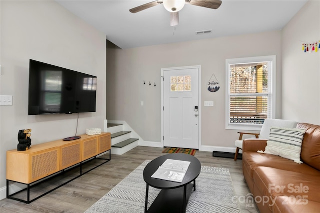 106 Dalton St, Black Mountain, NC 28711 - living area featuring a ceiling fan, wood finished floors, and baseboards