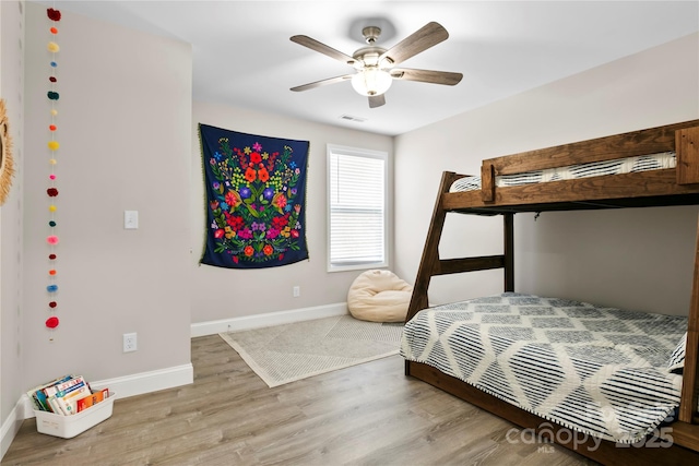 106 Dalton St, Black Mountain, NC 28711 - bedroom featuring wood finished floors, baseboards, and ceiling fan