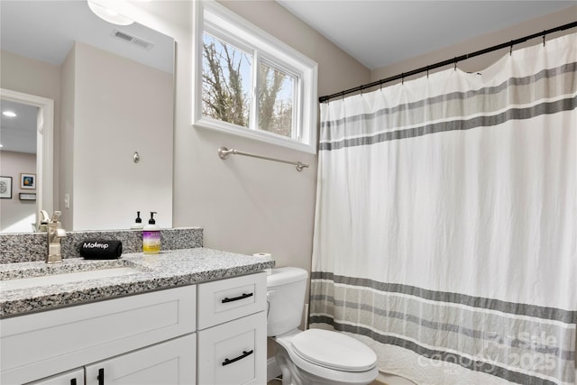 106 Dalton St, Black Mountain, NC 28711 - bathroom with toilet, vanity, recessed lighting, and curtained shower