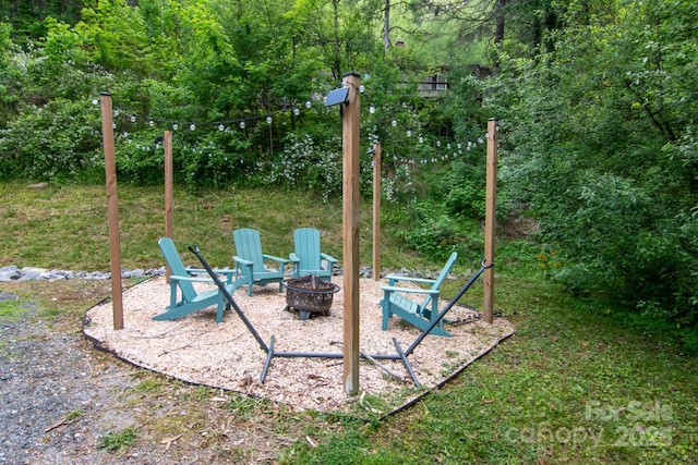 106 Dalton St, Black Mountain, NC 28711 - view of jungle gym with an outdoor fire pit