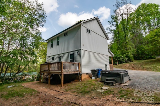 106 Dalton St, Black Mountain, NC 28711 - rear view of property featuring a wooden deck, a hot tub, and stairway