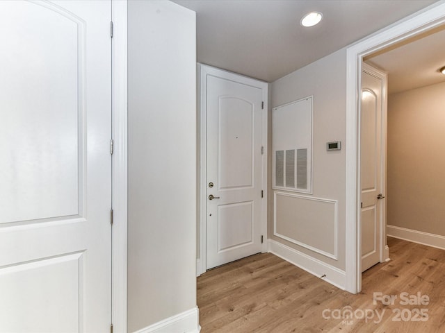 4625 Piedmont Row Dr Unit 410, Charlotte, NC 28210 - hallway with light wood-type flooring, baseboards, and recessed lighting