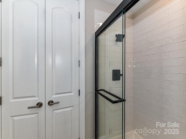4625 Piedmont Row Dr Unit 410, Charlotte, NC 28210 - bathroom featuring a stall shower