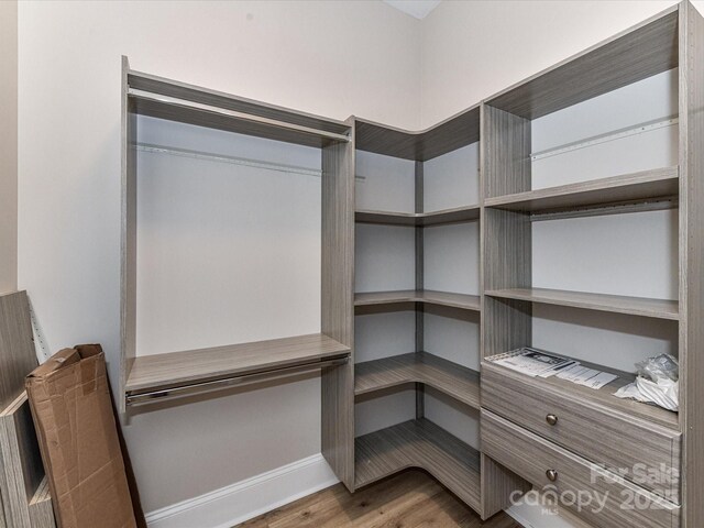 4625 Piedmont Row Dr Unit 410, Charlotte, NC 28210 - spacious closet featuring wood finished floors