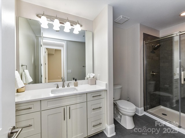 4625 Piedmont Row Dr Unit 410, Charlotte, NC 28210 - full bath with toilet, tile patterned flooring, a shower stall, vanity, and baseboards