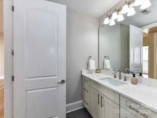 4625 Piedmont Row Dr Unit 410, Charlotte, NC 28210 - bathroom featuring vanity and baseboards