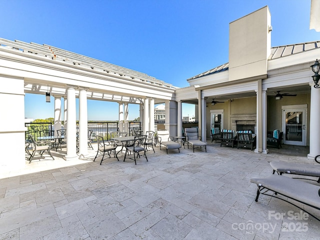 4625 Piedmont Row Dr Unit 410, Charlotte, NC 28210 - view of patio featuring a ceiling fan and outdoor dining space