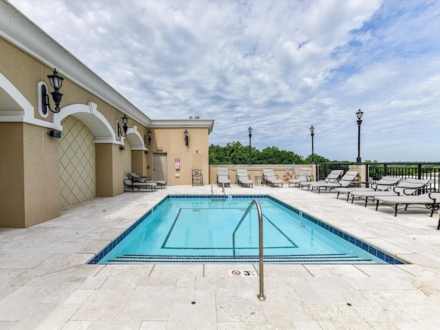 4625 Piedmont Row Dr Unit 410, Charlotte, NC 28210 - community pool featuring a patio area