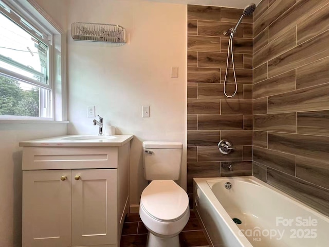full bathroom with toilet,  shower combination, tile patterned floors, and vanity