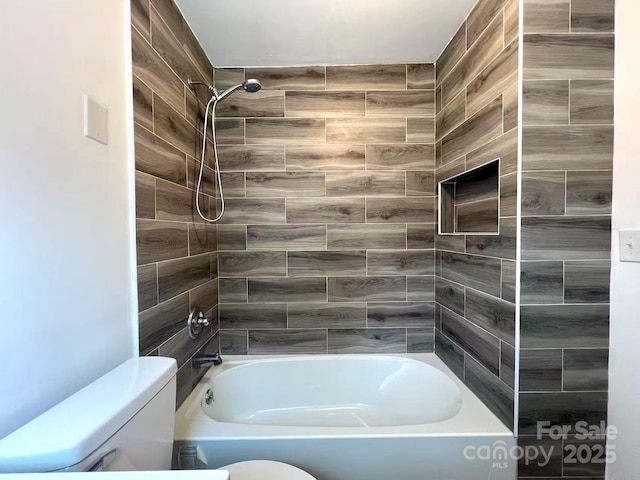 full bathroom featuring shower / bathing tub combination and toilet