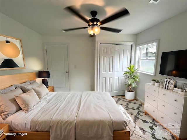 bedroom with a closet and ceiling fan