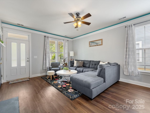 6909 Dunton St, Huntersville, NC 28078 - living area featuring a ceiling fan, baseboards, visible vents, and dark wood-type flooring
