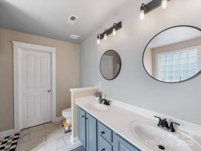 6909 Dunton St, Huntersville, NC 28078 - full bath featuring a sink, baseboards, toilet, and visible vents
