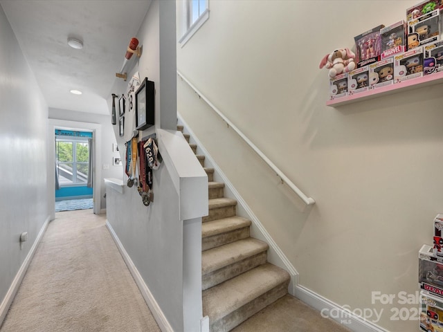6909 Dunton St, Huntersville, NC 28078 - stairs featuring baseboards and carpet