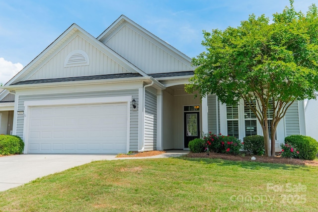 view of front of house with board and batten siding, an attached garage, concrete driveway, and a front lawn