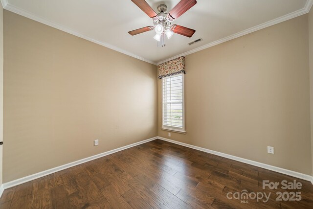 empty room featuring visible vents, a ceiling fan, baseboards, and dark wood-type flooring