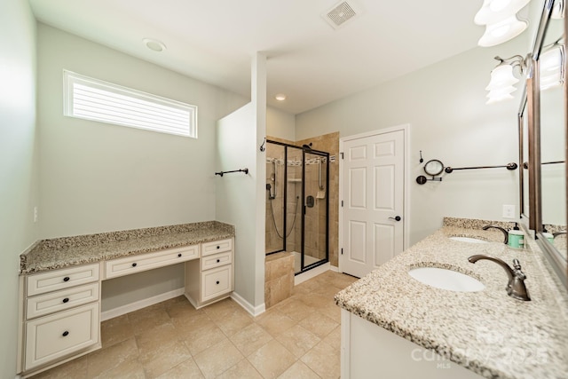 bathroom featuring visible vents, a sink, double vanity, and a shower stall