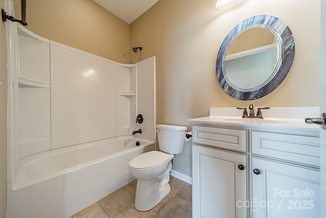 full bathroom featuring tile patterned flooring, vanity, baseboards, toilet, and tub / shower combination
