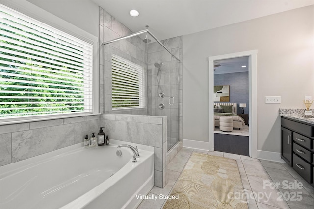 1209 Leigh Ave, Charlotte, NC 28205 - bathroom with a garden tub, a stall shower, and vanity