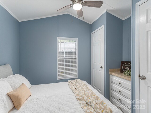 219 Pike Pt, Waynesville, NC 28785 - bedroom featuring crown molding, vaulted ceiling, and ceiling fan