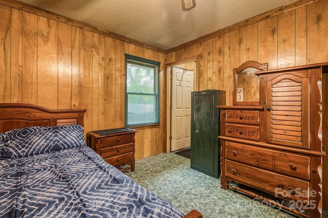 1533 Mcrary Creek Rd, Lenoir, NC 28645 - bedroom featuring wood walls, a textured ceiling, and crown molding