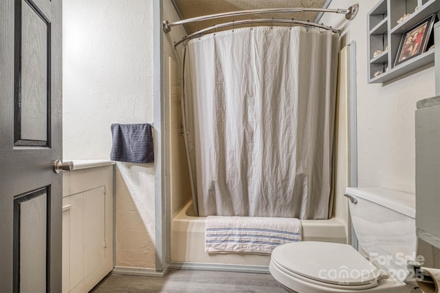 1533 Mcrary Creek Rd, Lenoir, NC 28645 - full bathroom with shower / bath combo with shower curtain, wood finished floors, a textured wall, and toilet