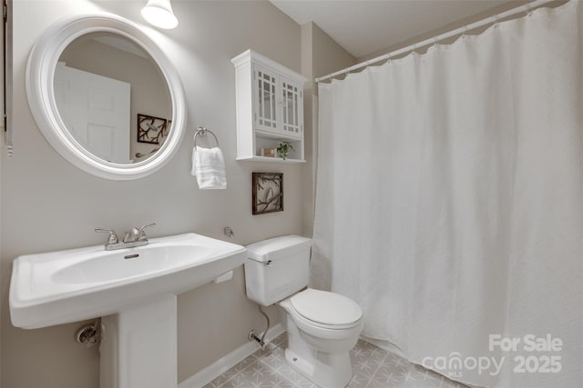 2209 Sumner Green Ave Unit M, Charlotte, NC 28203 - bathroom with toilet and a sink