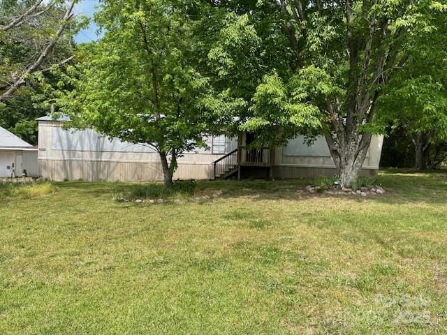 view of yard with stairway