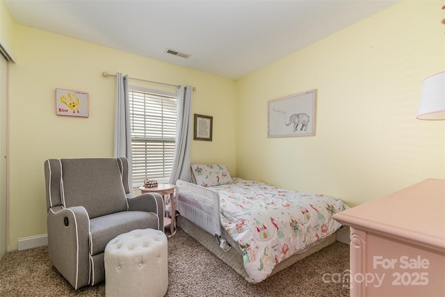 bedroom with carpet and visible vents