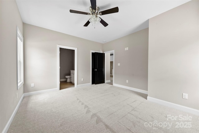 213 Benfield Rd, Kings Mountain, NC 28086 - unfurnished bedroom featuring light colored carpet, ensuite bath, and ceiling fan