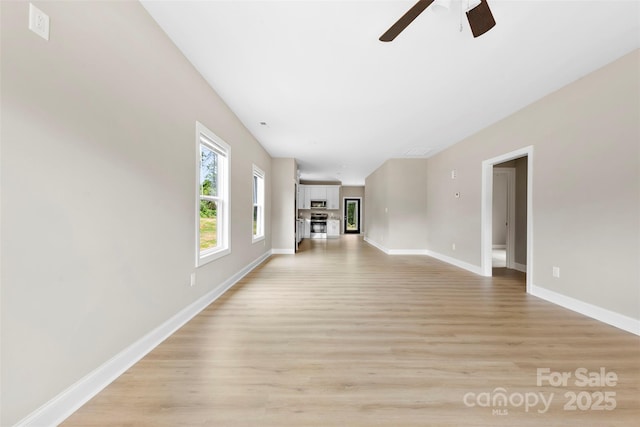 213 Benfield Rd, Kings Mountain, NC 28086 - unfurnished living room featuring ceiling fan and light wood-type flooring