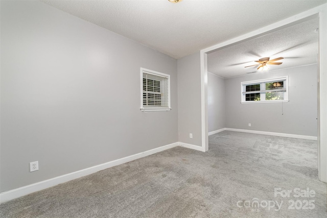 4700 Hickory Grove Rd, Mount Holly, NC 28120 - unfurnished room with carpet, baseboards, a textured ceiling, and a ceiling fan