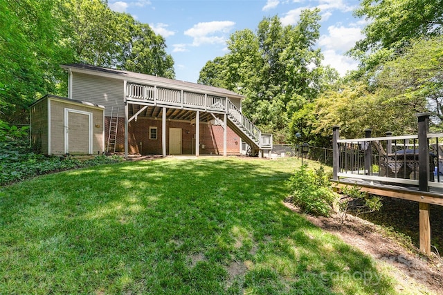 4700 Hickory Grove Rd, Mount Holly, NC 28120 - rear view of property featuring a wooden deck, a shed, stairway, a yard, and an outdoor structure