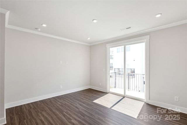 2013 Clarksdale Dr Unit 38, Charlotte, NC 28206 - spare room featuring ornamental molding, dark wood finished floors, baseboards, and recessed lighting