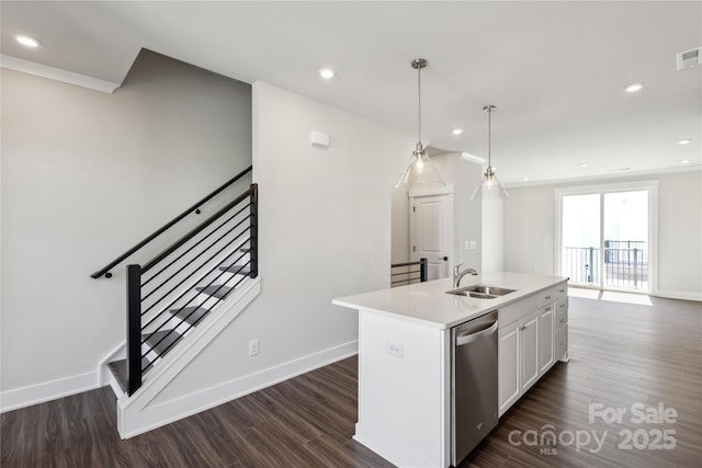2013 Clarksdale Dr Unit 38, Charlotte, NC 28206 - kitchen featuring dishwasher, a sink, dark wood-type flooring, light countertops, and white cabinets