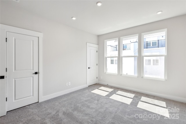 2013 Clarksdale Dr Unit 38, Charlotte, NC 28206 - carpeted spare room with baseboards and recessed lighting