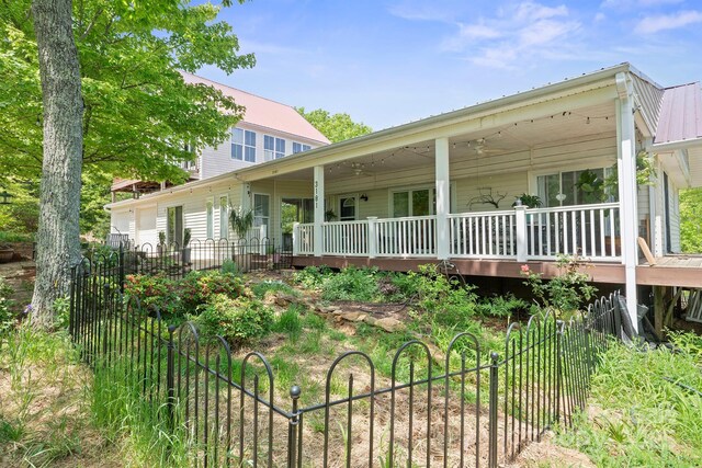 back of property with fence
