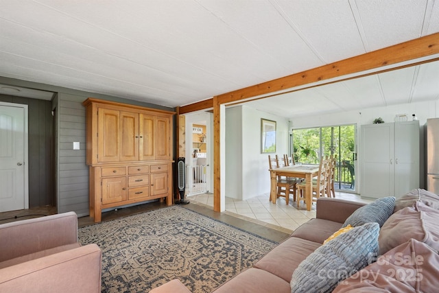 living room featuring beam ceiling