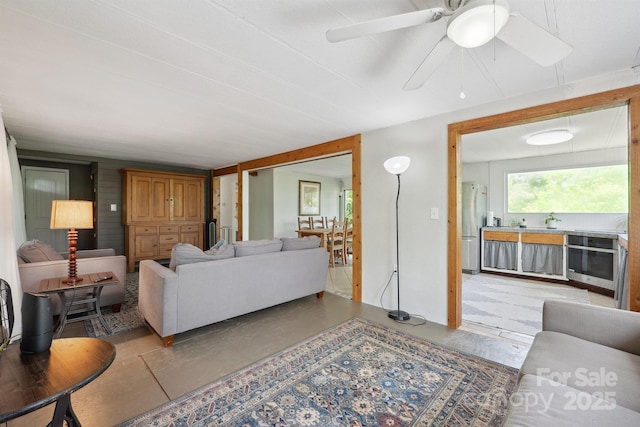 living room featuring ceiling fan