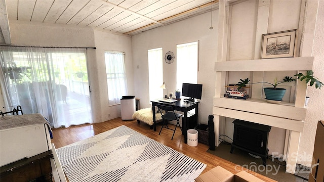 3181 Shag Bark Rd, Connelly Springs, NC 28612 - living area featuring wood ceiling, wood finished floors, and a wood stove