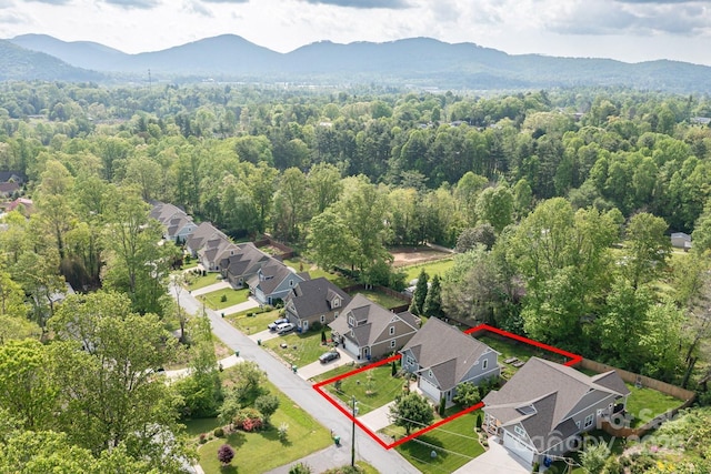 drone / aerial view with a mountain view and a residential view